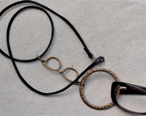 items similar to men s eyeglass holder with large bronze ring