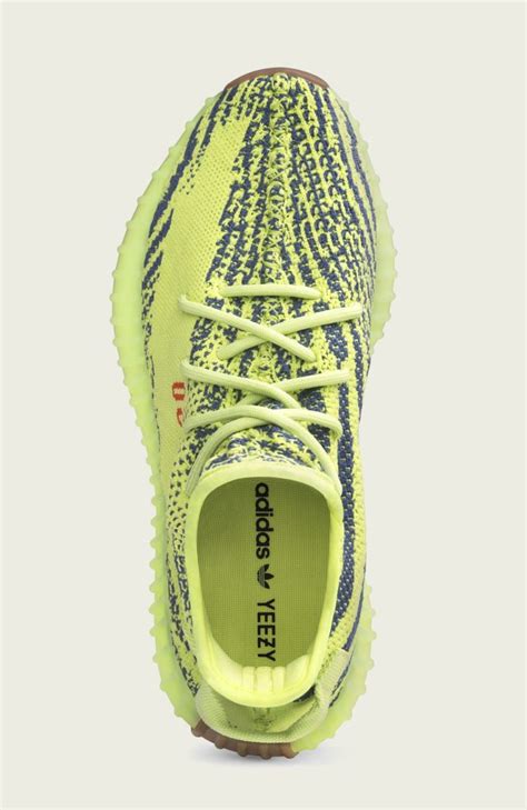 semi frozen yellow adidas yeezy boost   release info footwear news
