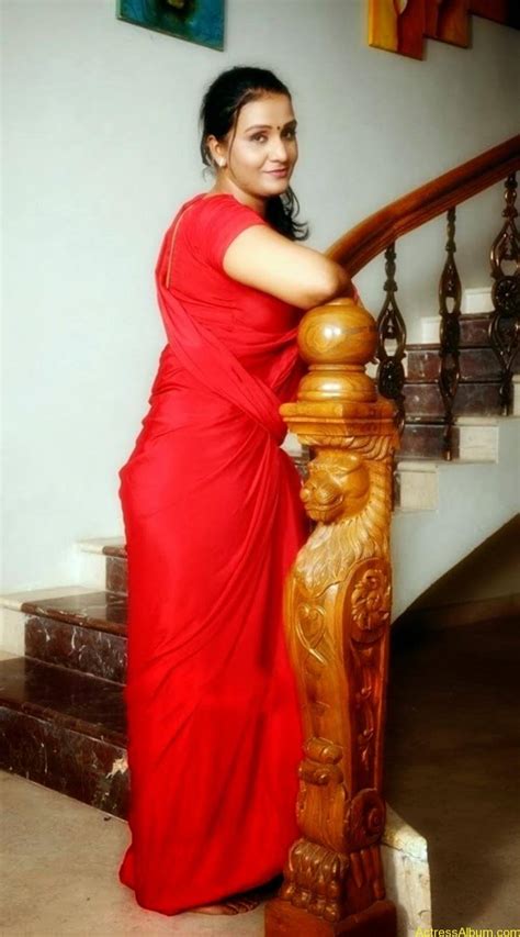 Actress Apoorva Very Hot In Red Saree Photo Collection