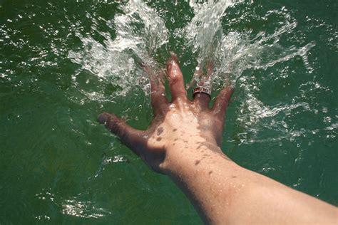 splash hand stock photo freeimagescom