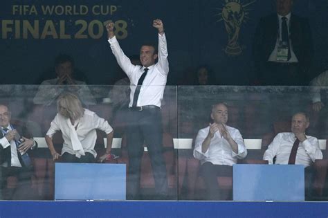 french president emmanuel macron jumped on a table to celebrate world