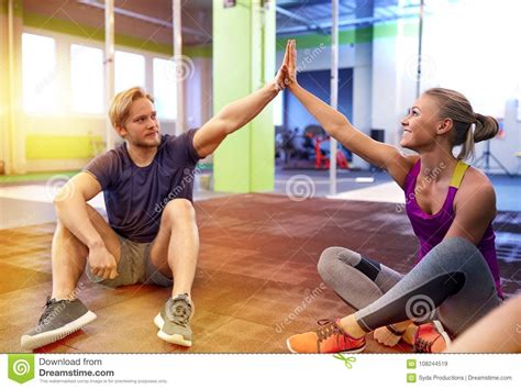 Happy Couple Making High Five In Gym Stock Image Image
