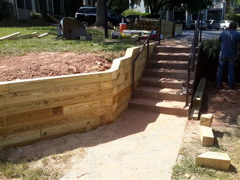 stabilizing  walkway   wooden retaining wall camden landscape group