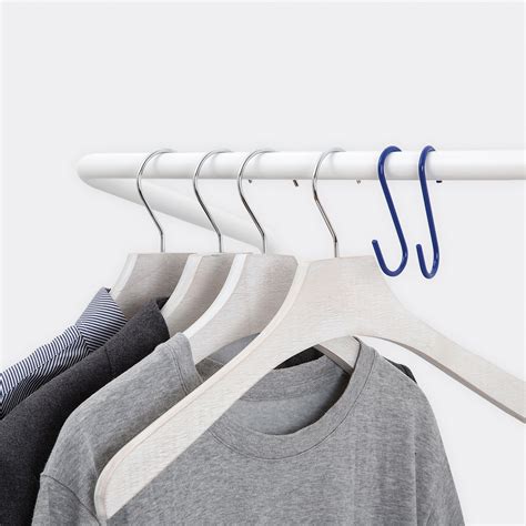 space efficient wall leaning clothes rail  minimal sleek style