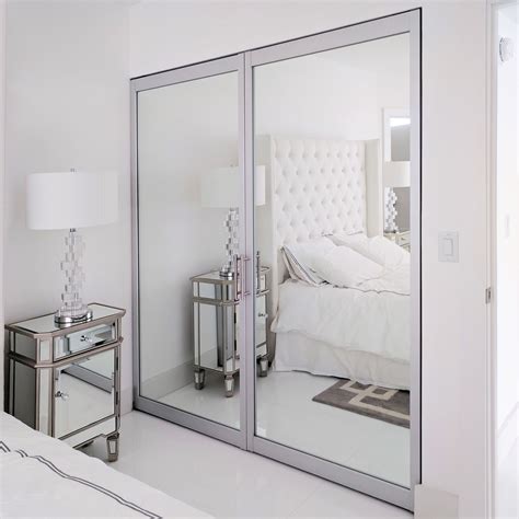 bedroom  mirrored walls  white furniture