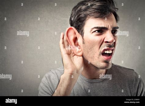 man listening   big ear stock photo alamy