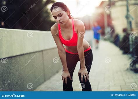 beautiful female jogger tired after running stock image image of