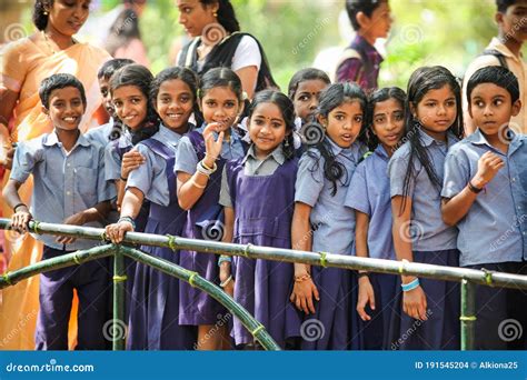 indian school children  traditional uniforms pose smiling