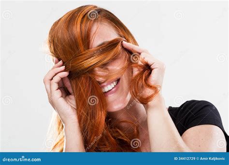 Playful Young Redhead Woman Being Shy Stock Image Image Of Happy