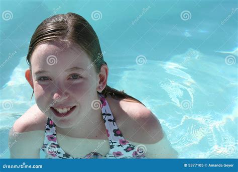 teen girl swimming royalty  stock photo image
