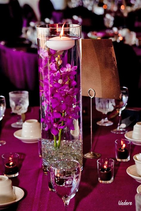Submerged Purple Orchid And Floating Candle Centerpiece Floating