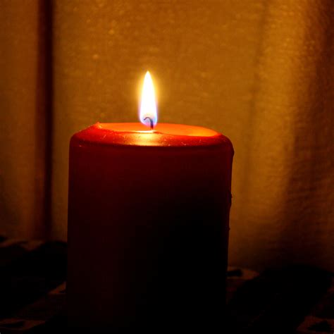 red burning candle picture  photograph  public domain
