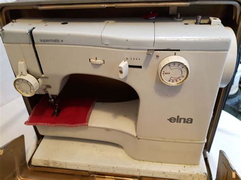 elna sewing machine  metal carrying case