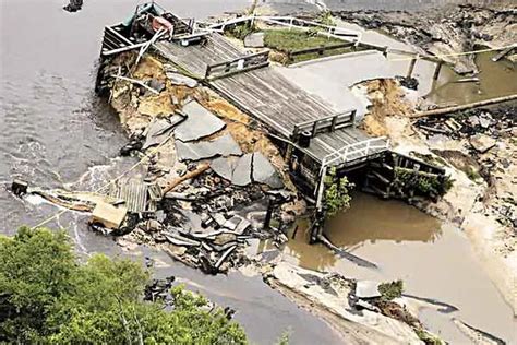final settlement   storm  toppled burlco dams