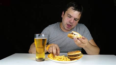 Portrait Of Greedy Fat Man Eating Burger On Stock Footage Sbv 316206584
