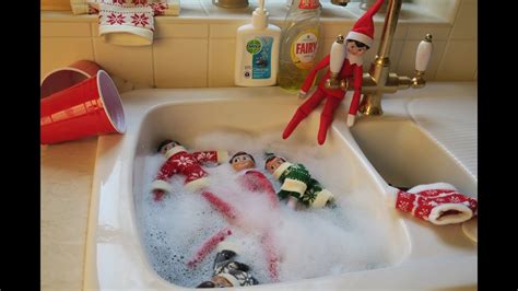 naughty elf dives into swimming pool youtube