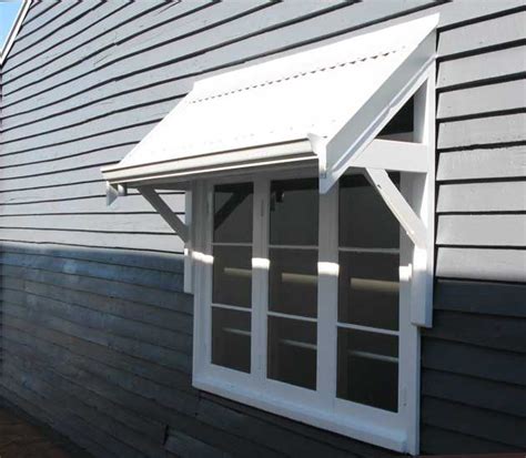 awning bracket google search home improvement pinterest small house exteriors smallest