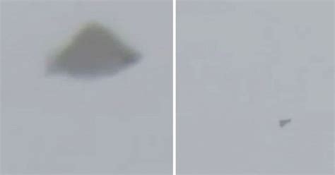 watch strange pyramid shaped ufo flies next to jet