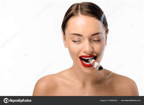 happy naked girl closed eyes smoking rolled dollar banknotes isolated