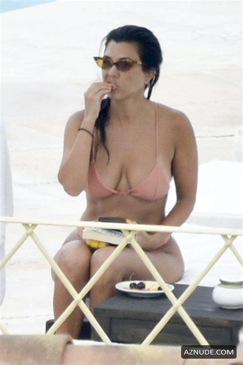 Kourtney Kardashian Showing Off Her Figures By The Pool