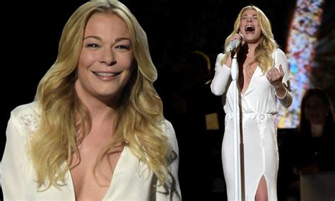 leann rimes puts cleavage on display in plunging gown during cma