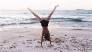 Lara Bingle Shows Off Her Local Australian Beach In Skin Tight Wetsuit