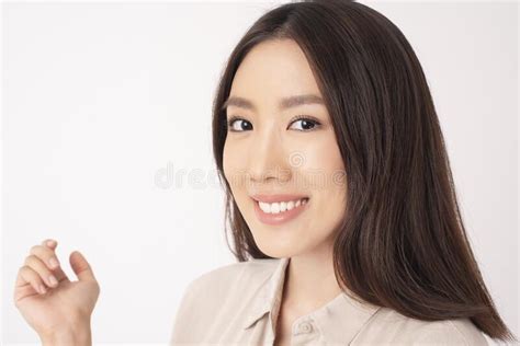 Close Up Of Asian Woman With Beautiful Teeth On White Background Stock