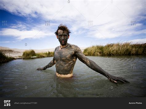 man covered  mud baths   hot springs tecopa california usa