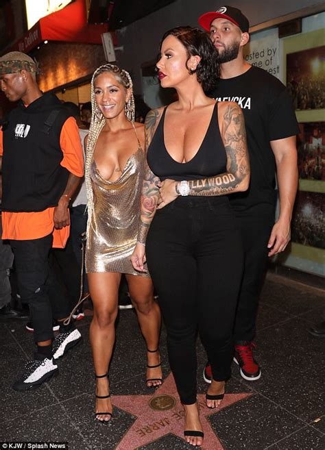 Amber Rose Oozes Sex Appeal In Black Wig At Hollywood Club