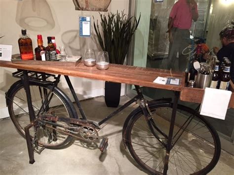 bicycle  parked  front   display case  liquor bottles
