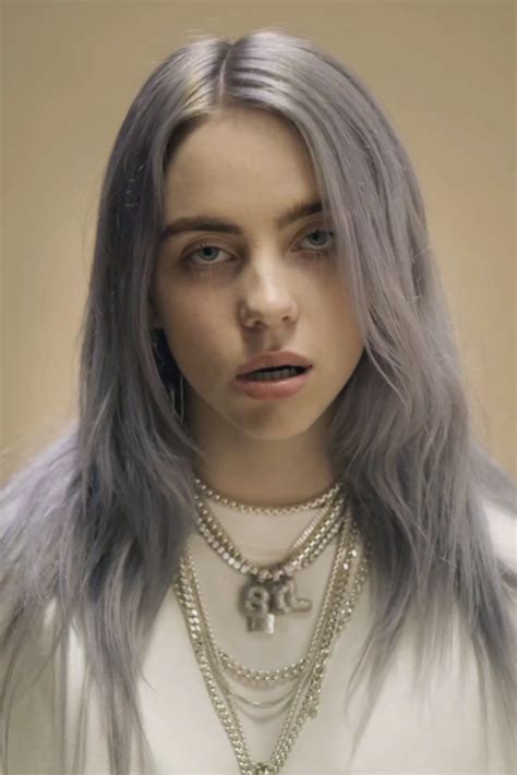 billie eilish wavy silver angled uneven color hairstyle steal  style