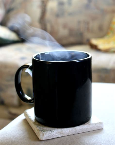 Steam Rising From Cup Of Hot Tea Picture Free Photograph
