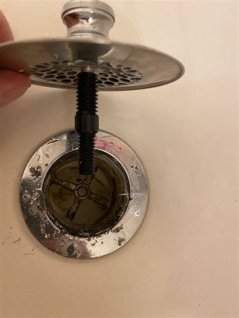clean hair    bathtub drain fix  drain