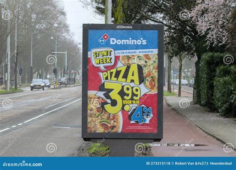 billboard domino  pizza  amsterdam  netherlands    editorial stock photo image