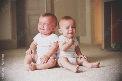 sad twins baby boys crying stock photo  royalty  images  fotoliacom pic