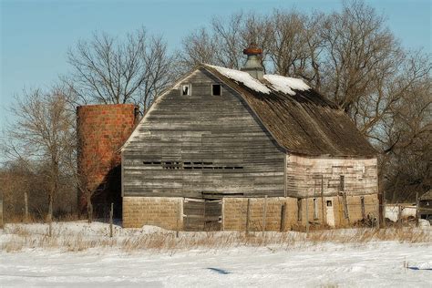 white barn   snow photograph  laurie
