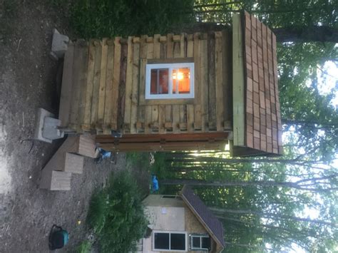 built  tiny cabin  recycled pallets