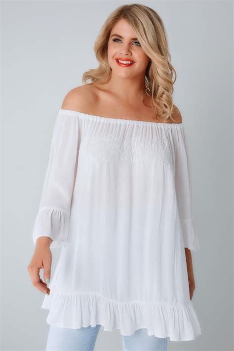 white bardot gypsy top with beaded details and flute sleeves