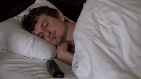 Man Laying In Bed During Morning Yawning Before Waking Up 4k Stock