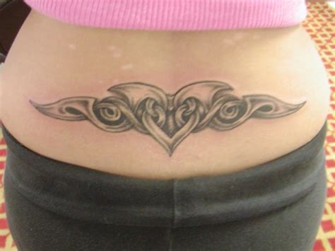 A Collection Of Lower Back Tattoo Designs For Women 2014