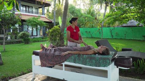 Woman Doing Massage To Girl In Asia Bali Indonesia Stock Footage