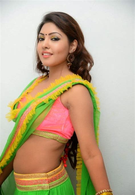 Actress Komal Jha Hot Sexy Pics In Green Dress Cap