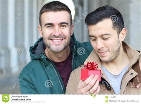 lovely same sex couple sharing affection stock image