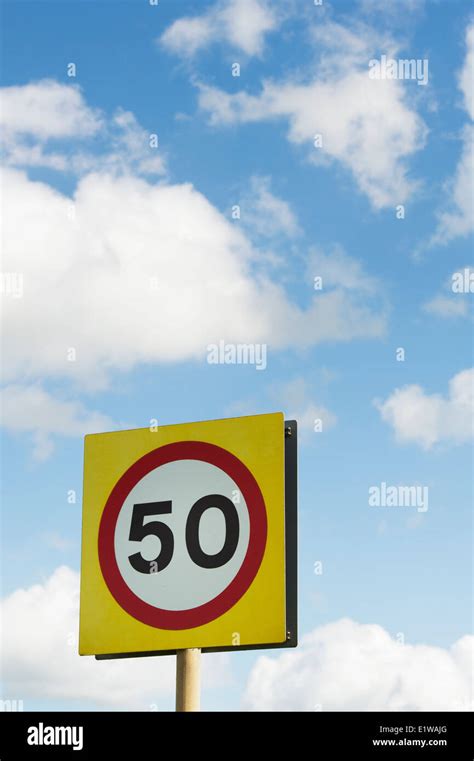mph speed limit road sign  blue cloudy sky england stock photo alamy
