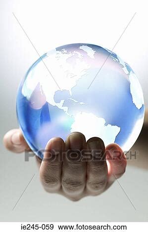 person holding planet earth stock photo   fotosearch