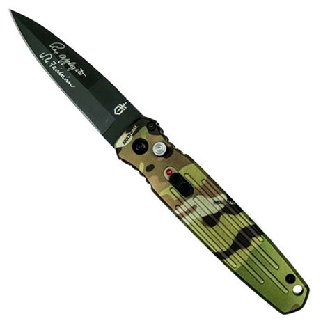 gerber   multicam covert auto knife cpm sv black blade