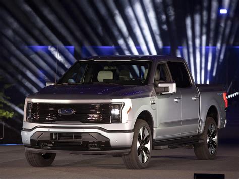 ford unveils    electric pickup truck ln