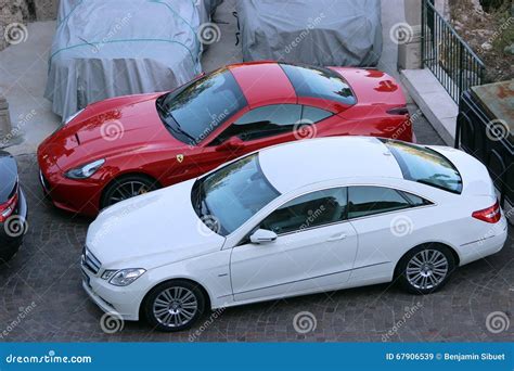 luxury cars parked   parking lot editorial stock image image