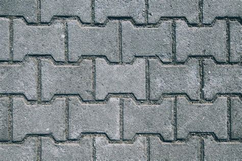concrete  shaped paving slabs surface stock photo  stevanovicigor