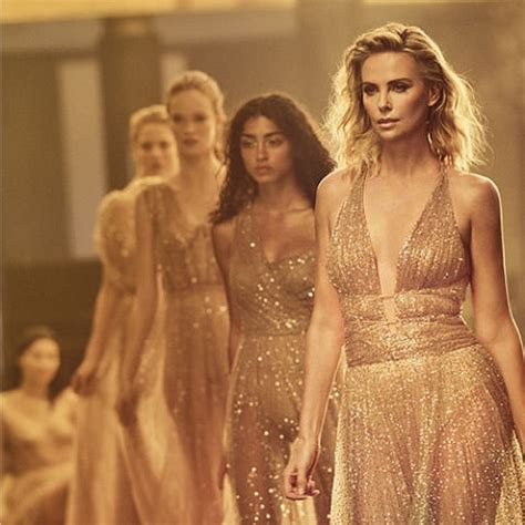 charlize theron is slinky for the dior j adore absolu campaign